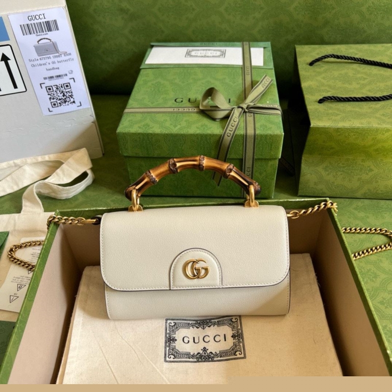G*u*i top handle bags